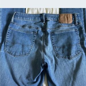 COPY - Men’s American Eagle Outfitters Next Level Flex medium wash slim blue je…